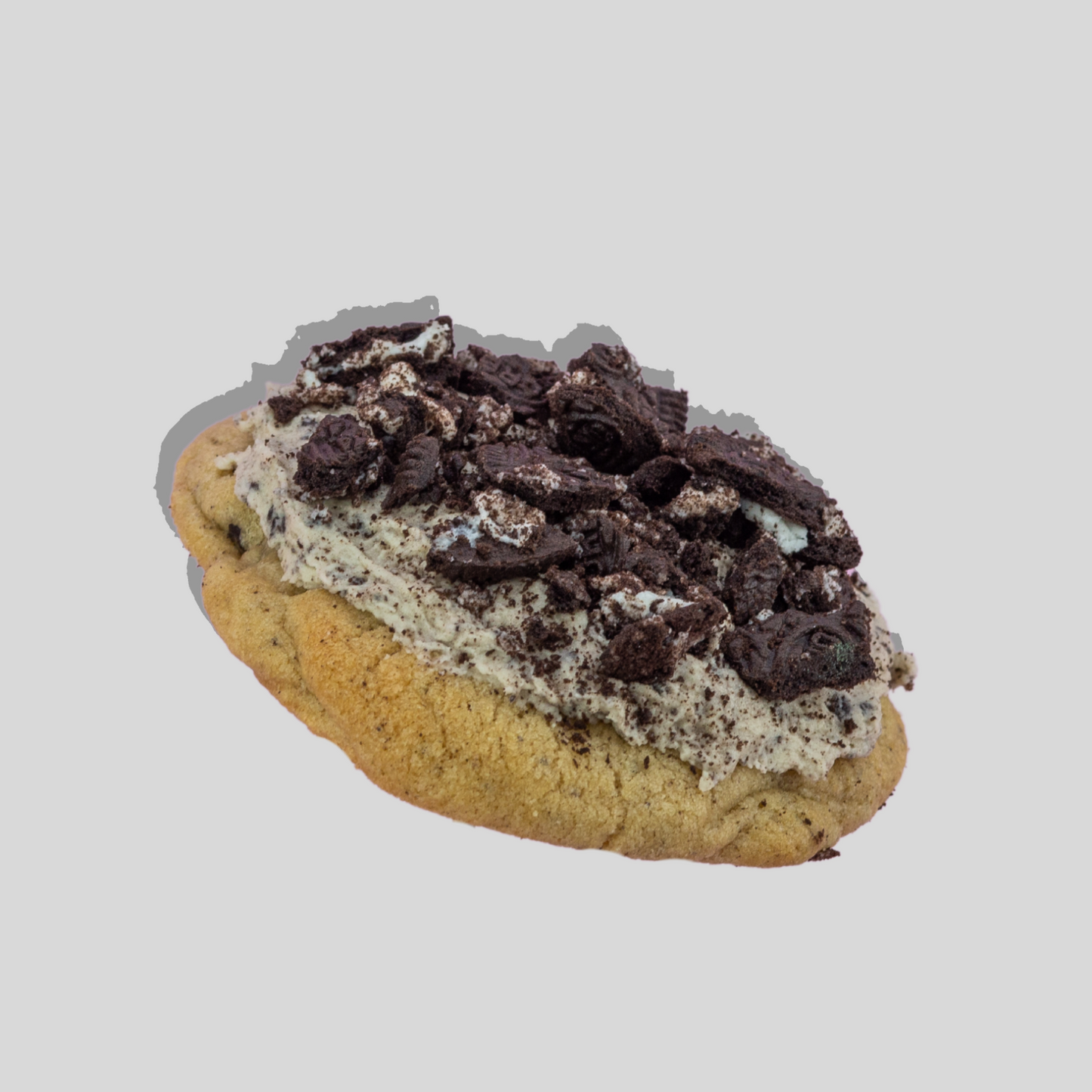 Cookies n Cream Maxi cookie with Oreo and white chocolate chip base, topped with Oreo buttercream and crushed Oreos.