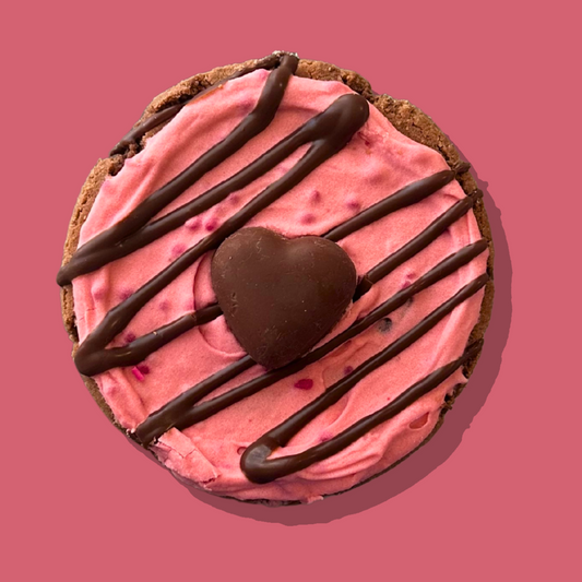 Dark Desire Maxi cookie with raspberry cream frosting and chocolate heart.