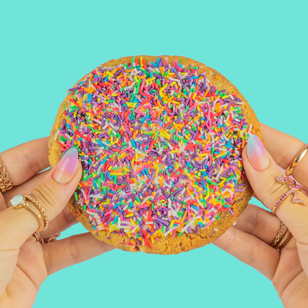 Cake Batter Maxi cookie with rainbow sprinkles and creamy frosting.