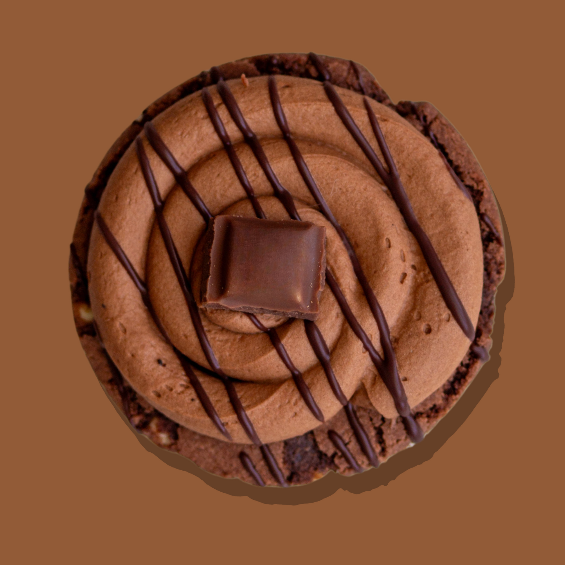 Thick n Rich Maxi cookie with triple chocolate base, dark chocolate cream cheese frosting, and chocolate drizzle.
