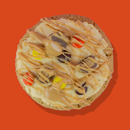 Reese's Pieces Maxi cookie with milk chocolate, peanut butter chips, peanut butter buttercream, and Reese's Pieces cups.