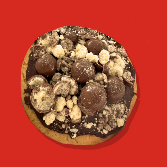 Malteser Maxi cookie with milk chocolate ganache and vibrant Maltesers.