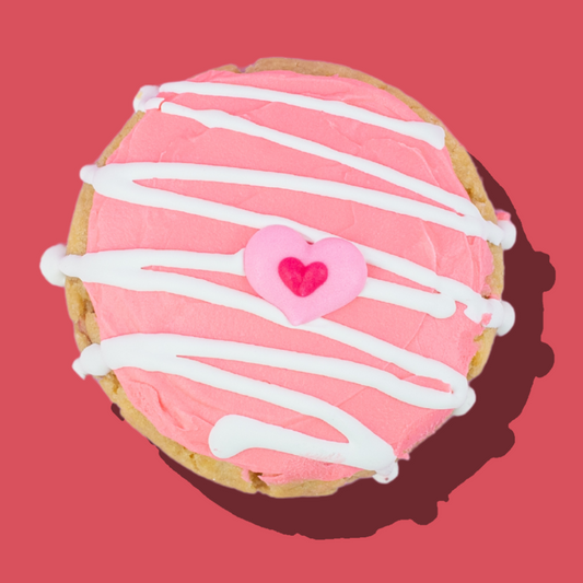 Strawberry Cheesecake cookie with white chocolate drizzle.
